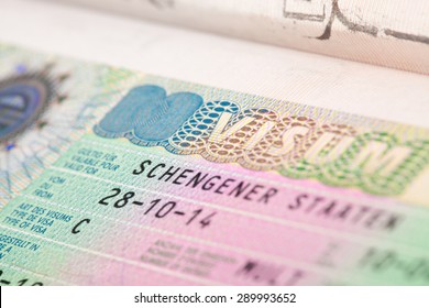 European Schengen zone visa in passport - close up - Shutterstock ID 289993652