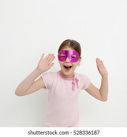 European Smiley Little Girl And Carnival Mask