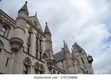 European stone gothic building facade with turrets.
