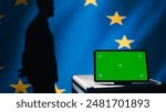 European Union agency operator using military tech on green screen tablet to identify threats from enemies. EU treaty security personnel using mockup device to relay info to war front lines, camera B