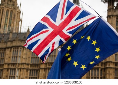 European Union and British Union Jack flag flying together. A symbol of the Brexit EU referendum - Shutterstock ID 1285308130
