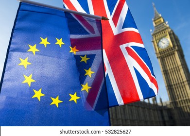 European Union And British Union Jack Flag Flying In Front Of Big Ben And The Houses Of Parliament At Westminster Palace, London, In Symbol Of The Brexit EU Referendum