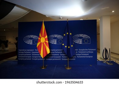 European union flag and flag of North Macedonia in the EU Parliament in Brussels, Belgium on April 27, 2021.
