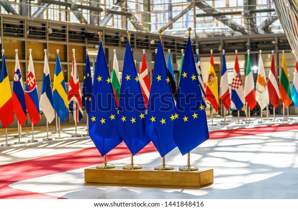 European Union flags in a flag rack and flags\
of the European Union countries\
