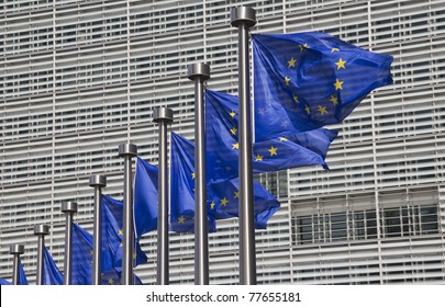 European Union Flags In Front Of The Berlaymont Building In Brussels, Belgium