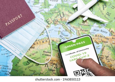 European Union Sets Out Virus Pass Plan To Allow Free Travel By Summer. Covid Or Coronavirus Vaccine Certificate Or Passport App With Passport, Mask And Map Of Europe