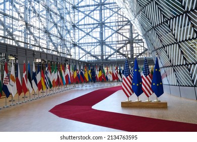 European and US flags in European Council in Brussels, Belgium on March 4, 2022.