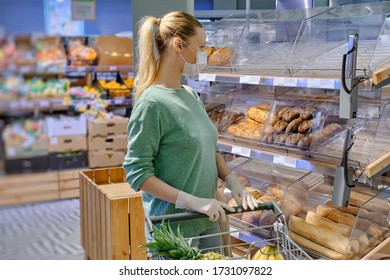 European Woman In Protective Mask And Gloves At The Bakery During Lockdown.