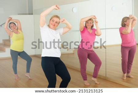 European women are dancing during the group training