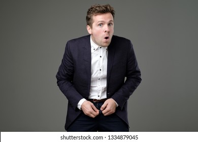 European Young Man In Suit Zip His Pants Up. Problem With Broken Fly.