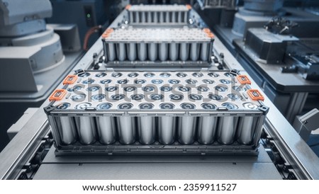 EV Battery Production Factory. Close-up of Lithium-ion High-voltage Battery Components for Electric Vehicle or Hybrid Car. Battery Module for Automotive Industry Production Line.