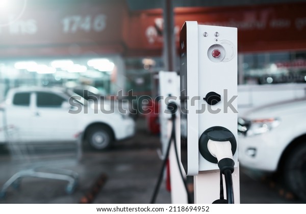 Ev electric car pump charging station hub,\
power supply cable electric car vehicle, renewable energy resources\
sustainable eco environmental friendly power, transport industry\
automobile futuristic.