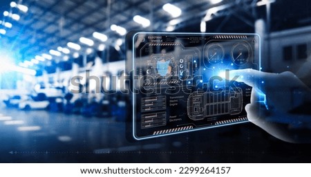 EV electric vehicle technology industry concept, futuristic virtual graphic touch user interface on screen with auto repair garage blurred on background.