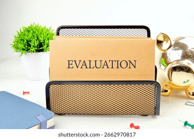 EVALUATION word. Learning, improvement, planning and development business concept.