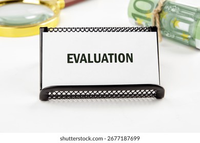 EVALUATION word. Learning, improvement, planning and development business concept.