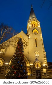 Evangelical Lutheran Cathedral Of Saints Peter And Paul- Today Christmas Eve(December 24)  In Moscow, Russia. Amazing Blue Hour Several Hours Later  Service With The Bishop. Christmas Tree With Lights