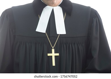 An Evangelical Pastor In Black Clothing Wearing A Golden Cross