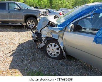 EVANS, GA - APRIL 4: damaged car in impound lot after an head on collision 2017