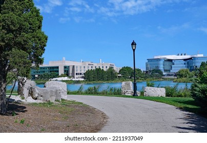 Evanston, IL - August 2022:  Lakefront Path On The Campus Of Northwestern University, With The Kellogg School Of Management Building