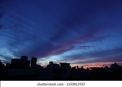 Evening bright sky over the black silhouette of the city. Sunset in the city Danang.  - Shutterstock ID 1533812537