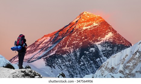 Evening colored view of Mount Everest from Gokyo valley with tourist on the way to Everest base camp, Sagarmatha national park, Khumbu valley, Nepal  - Shutterstock ID 347564906