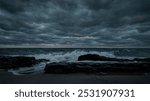 Evening dramatic sky with storm clouds, stormy ocean shore