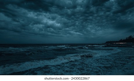Evening dramatic sky with storm clouds, stormy sea