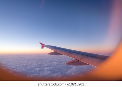 Evening Flight On Twilight Sky, Amazing View From The Window Plane.