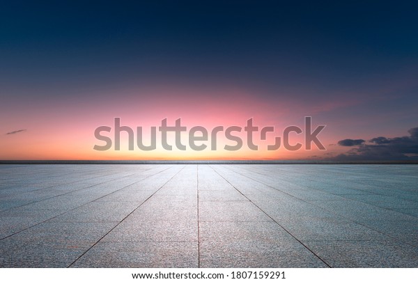  Evening glow,\
flat and wide asphalt road