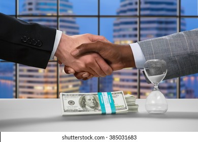 Evening Handshake In Business Center. Call It A Deal. No Way Back Now. Giants Of Megalopolis' Business.