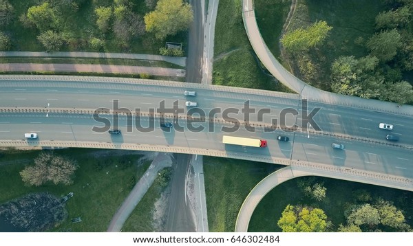 Evening\
highway traffic. Aerial shot, top down\
view