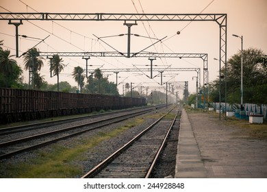 Evening At Indian Railway Platform With Goods Train