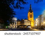 Evening landscape of the central Grote Markt square with a view of St. Martin Church in city of Kortrijk, Belgium