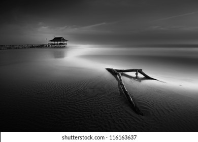 Evening low tide the sea from the pier - Powered by Shutterstock