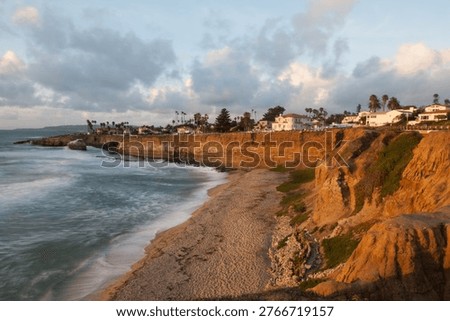 Evening on sunset cliffs along Ocean Beach, San Diego, California, blurred water from longtime exposure