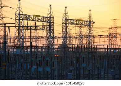 At evening, Power transmission towers line in electric power plant to bring electrical energy to the country, province or other industries.