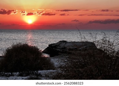 Evening rocky shore of the Caspian Sea. Sunset. 12 October 2024 year. - Powered by Shutterstock