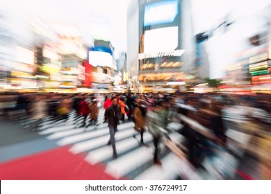 Evening Rush Hour At The Famous Shibuya Crossing In Tokyo, Japan. This Area Is Known As One Of The Fashion Centers Of Japan.