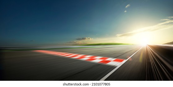 Evening scene asphalt international race track with starting or end line, digital imaging recomposition background. - Shutterstock ID 2101077805