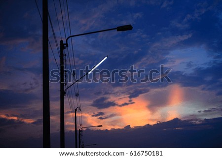 Similar – Lamps and electricity cables on sunset