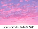 Evening sky with pink dramatic clouds. Dramatic Sunset, Sky clouds in the evening with pink, purple sunlight in Golden hour and dramatic fluffy, horizon setting sun Summer sky landscape. Nature bg 
