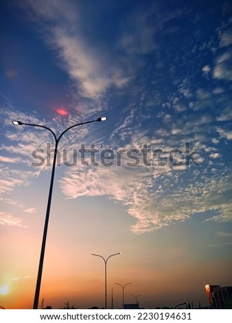 Similar – Lamps and electricity cables on sunset