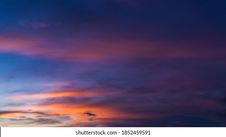 Evening sky,Amazing Colorful sky and Dramatic Sunset,Majestic Sunlight Cloud fluffy,Idyllic Nature Peaceful Background,Beauty Dark Blue Hour on Dusk,Purple Nightfall on twilight - Shutterstock ID 1852459591