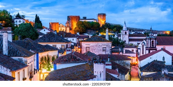 Evening Skyline Of Obidos Village In Portugal; Twilight Cityscape Of Medieval Village For Holiday Destination