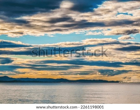 Evening storm clouds over the Northern Rivers coastline, seen from Byron Bay, New South Wales, Australia