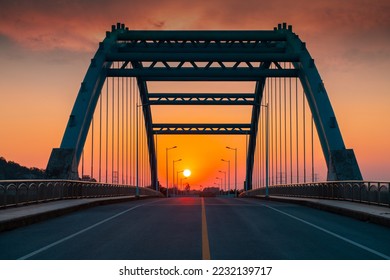 In the evening, the sun sets, and the high-speed kilometers through the arch bridge - Powered by Shutterstock