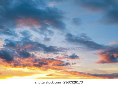 In the evening the sun was setting, making the sky a very beautiful orange color.

A natural phenomenon that makes me wonder why there are clouds with rainbows hidden within them.
