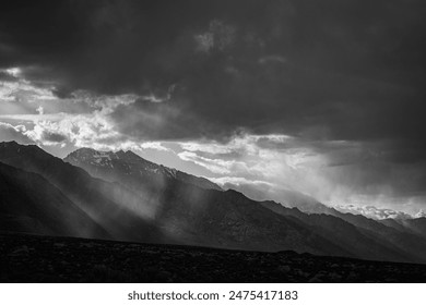 The evening sun shines on ridges of the Sierra Nevada mountain range. - Powered by Shutterstock