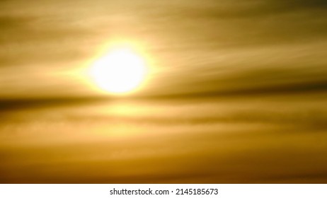 Evening Sun Through Overcast Clouds On A Hot Misty Sky, Timelapse. Sunset In A Haze Of Thick Yellow Clouds, Time Lapse