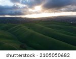 Evening sunlight shines on hills in the Tri-valley region of Northern California, just east of San Francisco Bay. This beautiful area, Dublin, Pleasanton and Livermore, is home to many wineries.